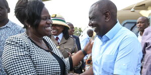 Homa Bay Governor Gladys Wanga (left) receives President William Ruto in Homa Bay on Friday January 13, 2023