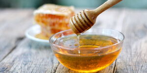 Honey harvested into a bowl.