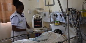 A nurse attends to a patient at an ICU ward at the Moi Teaching and Referral Hospital in Eldoret, Uasin Gishu County in January 2020