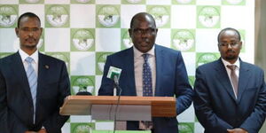 IEBC Commissioners led by Wafula Chebukati addressing the press at a past event.