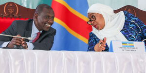 President William Ruto and President Samia Suluhu of Tanzania at the EAC Heads of State meeting in Arusha.