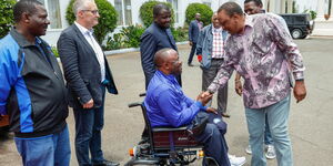 President Uhuru Kenyatta shakes hands with Westlands MP Tim Wanyonyi at State House Grounds on March 7, 2020.