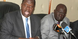 Interior CS Fred Matiang'i (left) and his Education counterpart George Magoha.