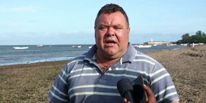 Italian Tycoon Basta Alessandro speaking to the press