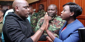 Digital Strategist Dennis Itumbi (left) with Jacque Maribe (left) in court in 2019