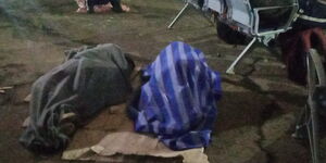 JKIA Cleaning staff sleeping outside one of the terminal on Monday night, April 28, 2020.