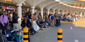 Passengers at a waiting bay at the Jomo Kenyatta International Airport (JKIA). 
