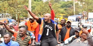 Kiss FM presenter Jalang'o waves to his supporters on Friday, December 11, 2021