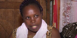 Cancer patient Jane Njeri speaks to the press on Saturday, May 16, 2020, in Kangemi.