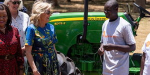 US First Lady Jill Biden (in blue flowery dress) interacts with Kenyans during her visit to the country on February 26, 2023.