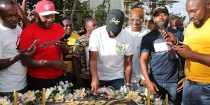 Mombasa Governor Hassan Joho (left) with comedian Jalang'o (right) at the formers birthday party on February 26, 2021 