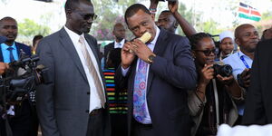 Deputy Chief of Staff Josephat Nanok and Attorney General Justin Muturi moments before the launch of the Hustlers Fund on November 30,2022. 