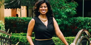 Media personality Julie Gichuru poses for a photo.