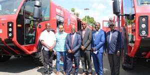 From Left: Francis Mbalanyathe, Ahmed Saee, Kenya Airports Authority Acting Managing Director Alex Gitari, Gabriel Rotich, Harrison Machio, and Richard Cherop during the launch of fire fighting trucks by KAA on Wednesday, March 11, 2020.