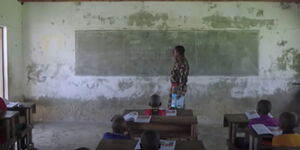 KDF officer Samuel Gitau during a lesson at Kiangwe Primary School in Boni Forest
