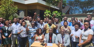 KMPDU Secretary General Davji Bhimji (centre), flanked by other officials, addresses the media at Lake Naivasha Resort, Nakuru County on January 13, 2023.