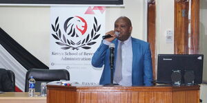 KRA Boss James Githii Mburu gives an address during a past event