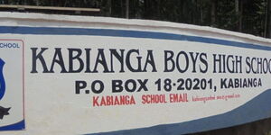 A gate wall showing the details of Kabianga Boys High School.