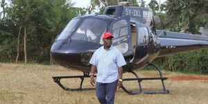 Former Kiambu Governor William Kabogo alights from a helicopter at a past function  