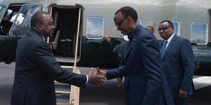Rwandan President Paul Kagame bids goodbye to President Uhuru Kenyatta who was attending a conference in Kigali, Rwanda on March 11, 2019