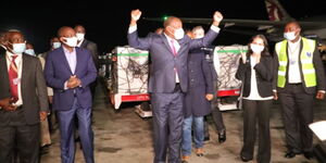 Health CS Mutahi Kagwe (centre) receiving the first batch of Covid-19 vaccine on Tuesday, March 2, 2021.