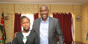 Kajiado Governor Joseph Ole Lenku (right) and former Saudi Arabia immigrant worker Lillian Rimanto.