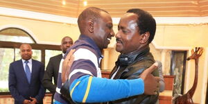President William Ruto consoles Wiper Party leader, Kalonzo Musyoka, at the burial of the latter's father in October 29, 2018
