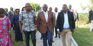 East African Legislative Assembly Member of Parliament Kanini Kega(left), President William Ruto(middle), and Jubilee Party National Chairman Nelson Dzuya(right) during an interdenominational Church service at the Nakuru Athletic Club Grounds, Nakuru County, on February 12, 2023