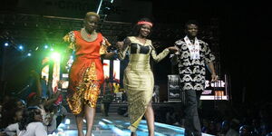 Fashion designer Kate Mayeye (centre) with fashion models during a past event
