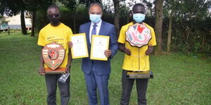 Keith Brian and Maxwell Okoth show off their trophy after winning Young Scientist Kenya award  in January 16, 2021