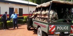 Kenya Police officers pictured outside a police station. A naked man stormed the Embakasi Police Station on Saturday night, June 13, 2020.