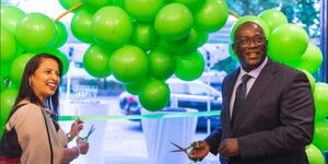 Kenyan Ambassador to UK Manoah Esipisu (right) and a guest during the launch of Eversure Charging in UK.
