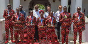 Kenyan Athletes Pose For A Photo With President Uhuru Kenyatta at State House on August 16, 2021.