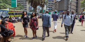 File image of Kenyans pictured walking in the capital, Nairobi
