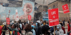 Kenyans march in Nairobi on June 8, 2020, to protest against police brutality during the coronavirus pandemic