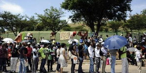 Kenyans queue at a past job interview.