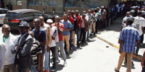 Kenyans queued outside an office