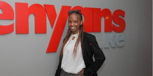 A Kenyans.co.ke employee poses for a photo at the company's offices in Westlands, Nairobi.