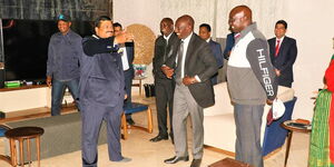 Kesses MP Mishra Swarup (left) shows DP William Ruto his Uasin Gishu home
