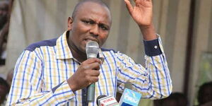 Kikuyu MP Kimani Ichung'wah addressing a congregation.