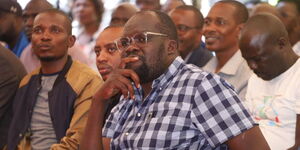 Kileleshwa MCA Robert Alai (centre) listens in during a meeting with Azimio's leadership in Nairobi on January 25, 2023. 