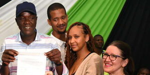 Kilifi governor-elect Gideon Mung'aro from left with his family holding a certificate on August 12, 2022