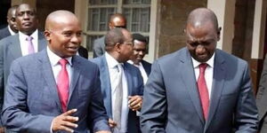 Tharaka Nithi Senator Kindiki Kithure (left) with Deputy President William Ruto (right) after attending a conference in 2019