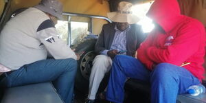 Three mysterious visitors who visited Marathon runner Kelvin Kiptum in a police vehicle at the Kaptagat Police Station on February 14, 2024.
