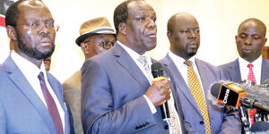 From left: Kisumu Governor Anyang’ Nyong’o, Council of Governor chairman Wycliffe  Oparanya and Trans Nzoia governor Patrick Khaemba address the press in Nairobi on December 16, 2019.