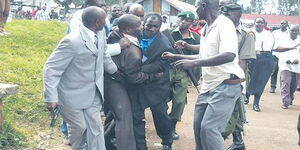 Shinyalu MP Justus Kizito being arrested by police in 2013.