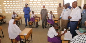 Education Cabinet Secretary Ezekiel Machogu witnessing the close of Day 1 KCPE English Language paper at St Mary's Bangladesh Primary School in Mombasa County on Monday, November 28,2022