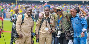 DCI Photographer (centre) with friends during a past event