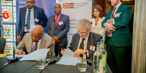 Trade Cabinet Secretary Moses Kuria signing a partnership deal with United Green Group, a UK firm, on Wednesday March 22, 2023