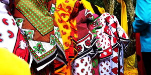 Ladies veiled for disguise during a dowry ceremony in Kenya.